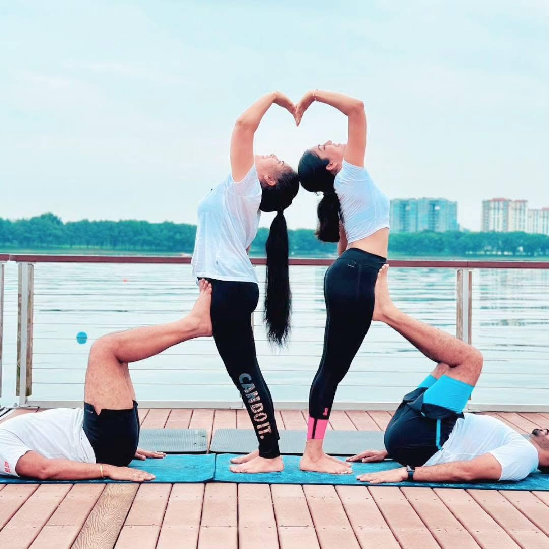 Partner heart pose on the deck